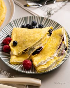 Light & Fluffy Protein Crêpes with Greek yogurt and berries – Quick Breakfast Idea