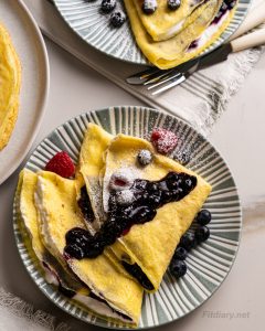 High protein crepes with Greek yogurt, blueberry sauce and berries