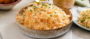 Homemade sauerkraut in a bowl showing a crunchy, naturally fermented cabbage texture