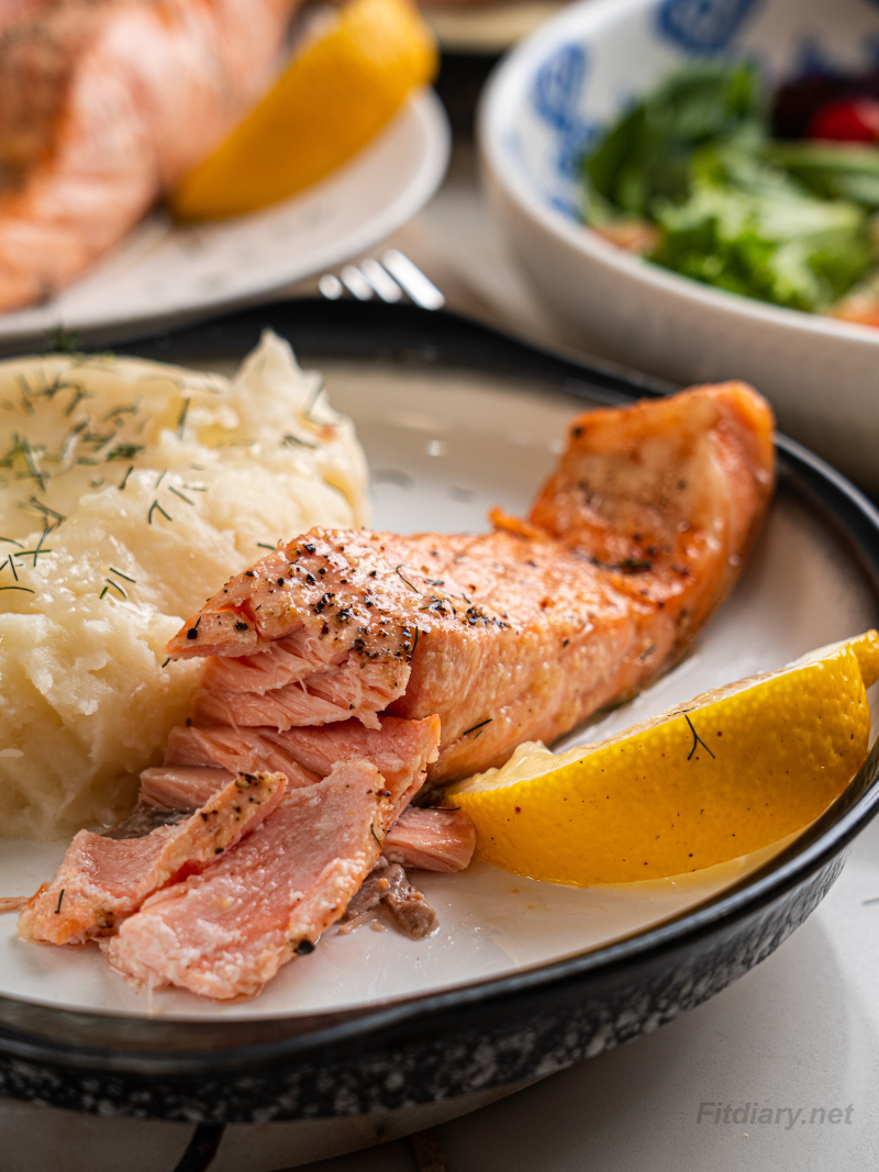 Close-up of flaked air fryer salmon showing tender, juicy inside texture